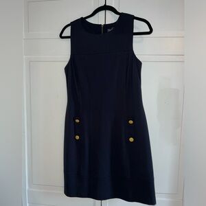 Navy blue Vince Camuto knee length dress with gold button detail. Size 6. NWT
